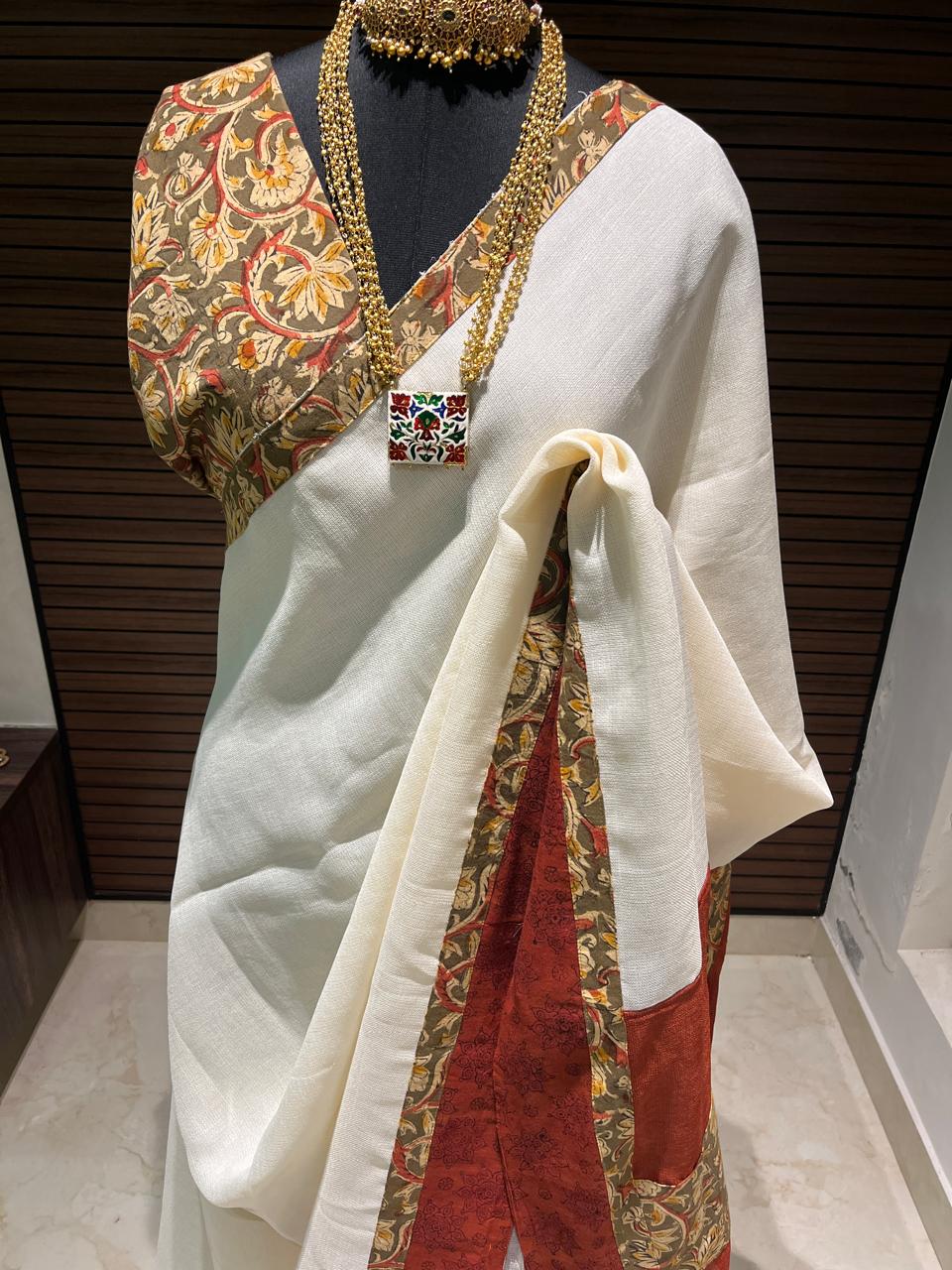 Cream and Black Jutenet Kalamkari Saree